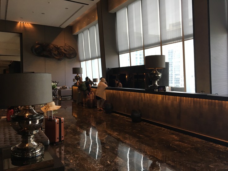 bangkok okura prestige lobby front desk