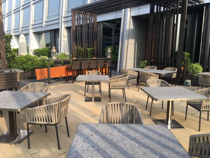 bangkok okura prestige pool seating area