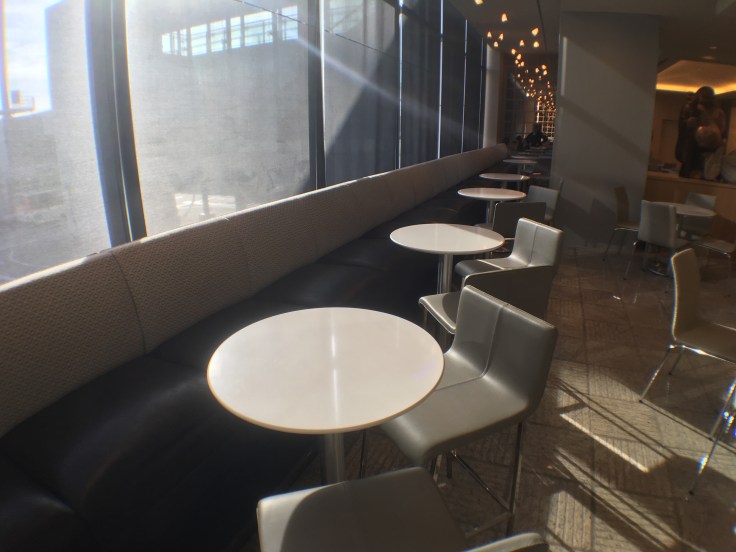 united club tokyo narita seating area with sunshade