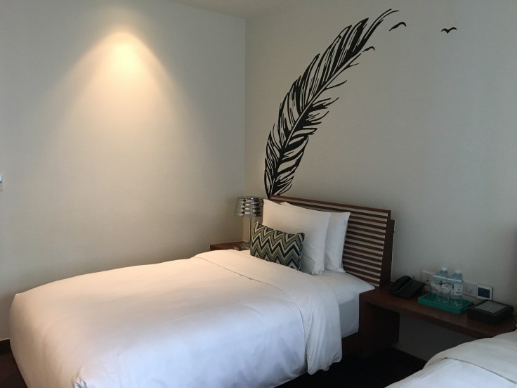 aviary hotel room bed decor 1