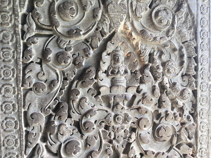 siem reap angkor wat stone carving divine inscription