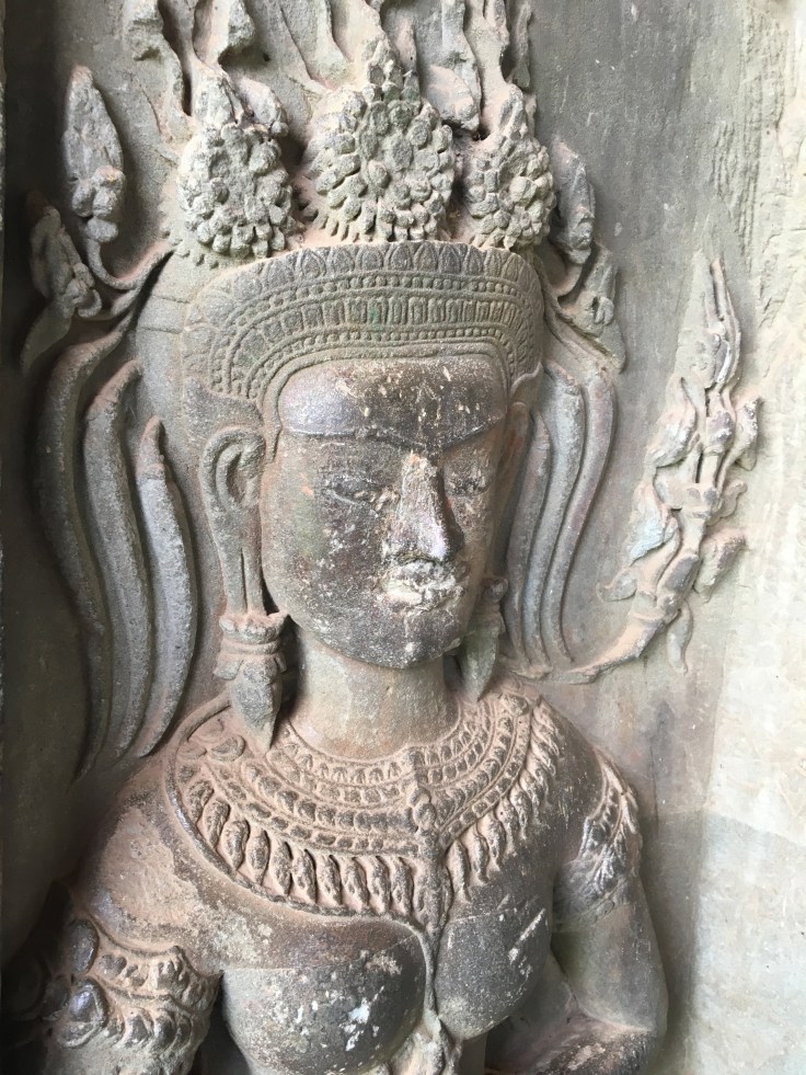 siem reap angkor wat stone carving religious figure