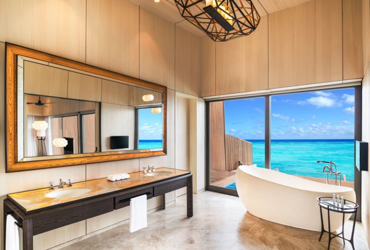 st regis maldives hotel overwater suite bathroom promo