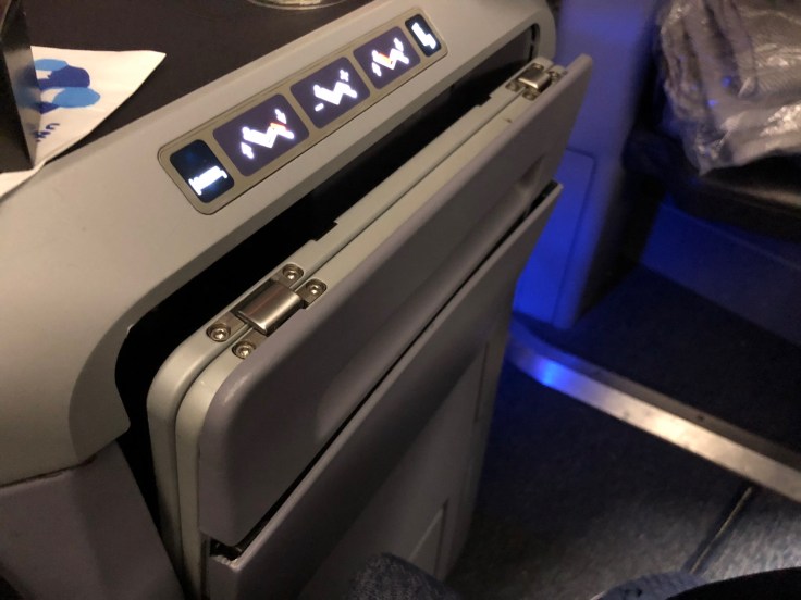 united airlines polaris business diamond hard seat tray table partial