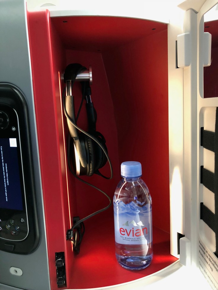 air france business hard seat side console storage nook