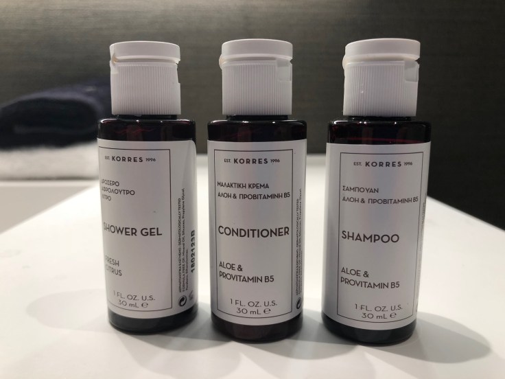 ac hotel new york times square bathroom shower toiletries branding