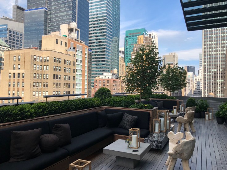 ac hotel new york times square public lounge terrace reverse angle