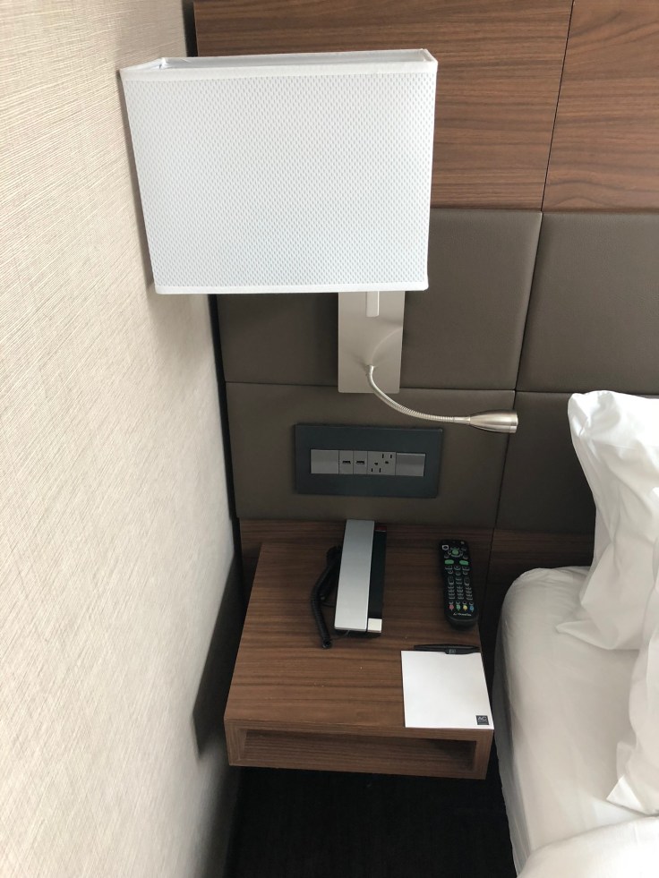 ac hotel new york times square room bed nightstand
