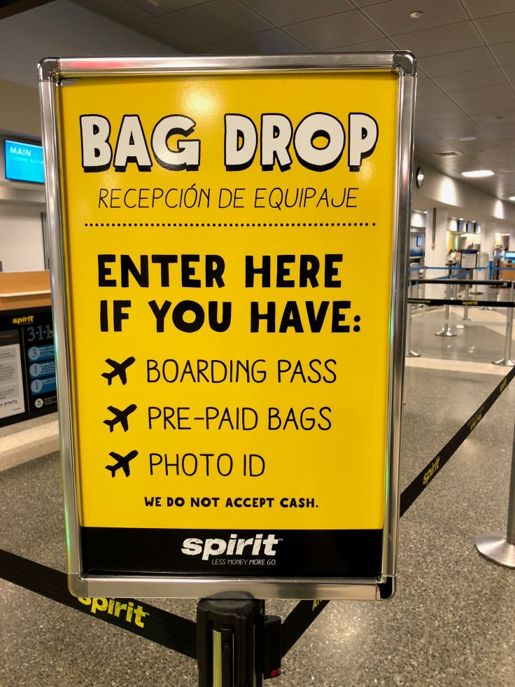 spirit airlines airport bag drop sign
