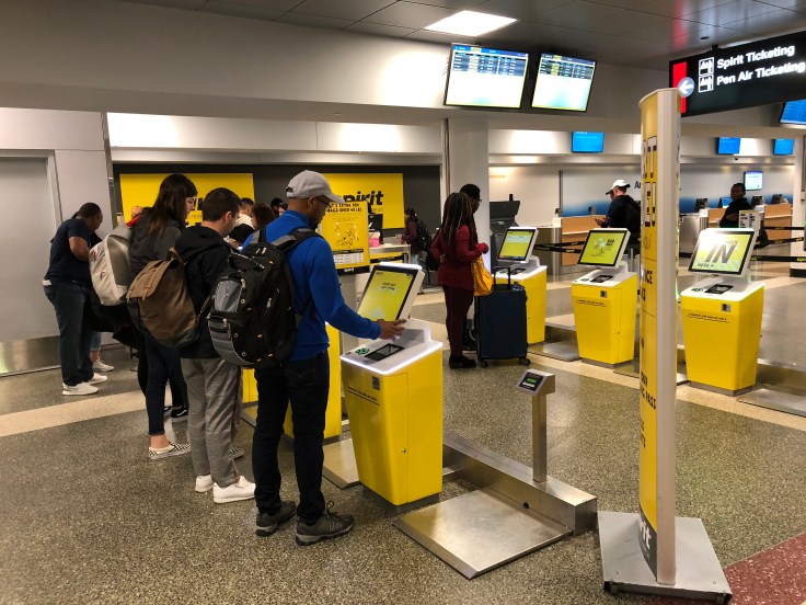 spirit airlines airport check in machines