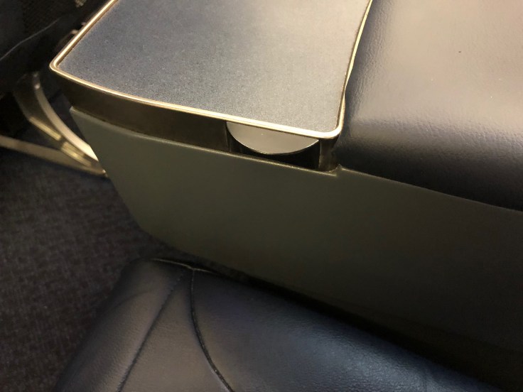 spirit airlines hard big front seat armrest inside