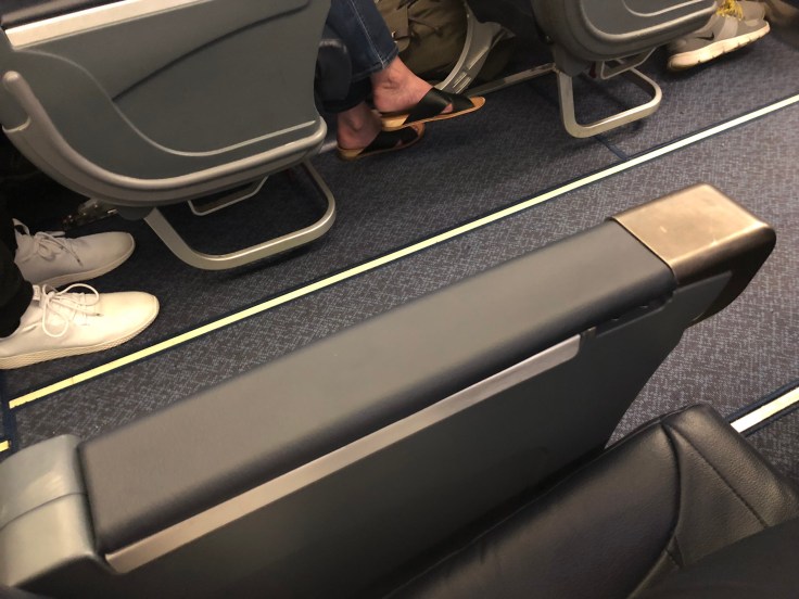 spirit airlines hard big front seat armrest outside