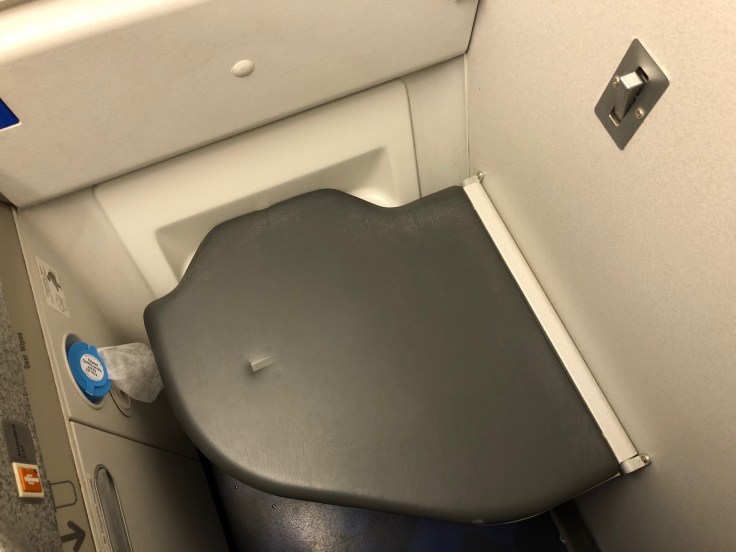 british airways club world cabin lavatory bench