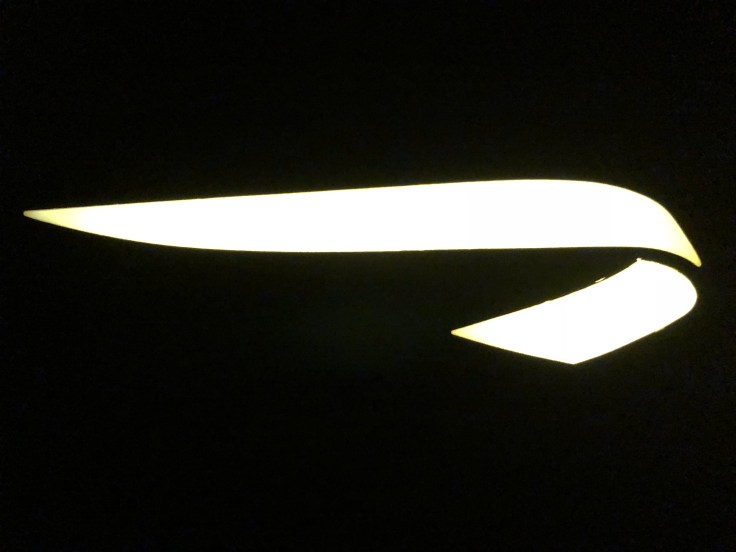 british airways club world cabin logo dramatically lit