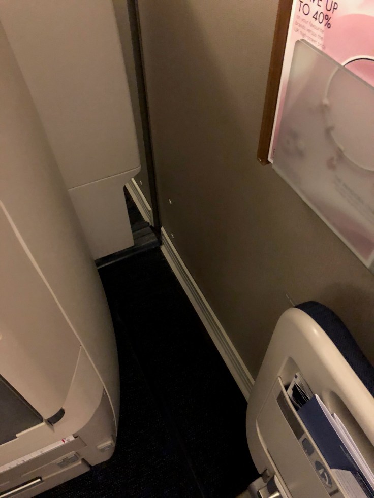 british airways club world hard seat hidden storage space