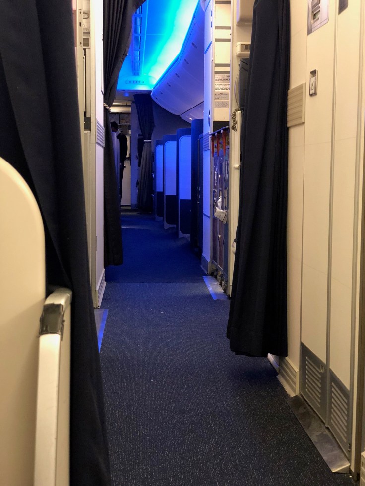 british airways club world hard seat view in to first class