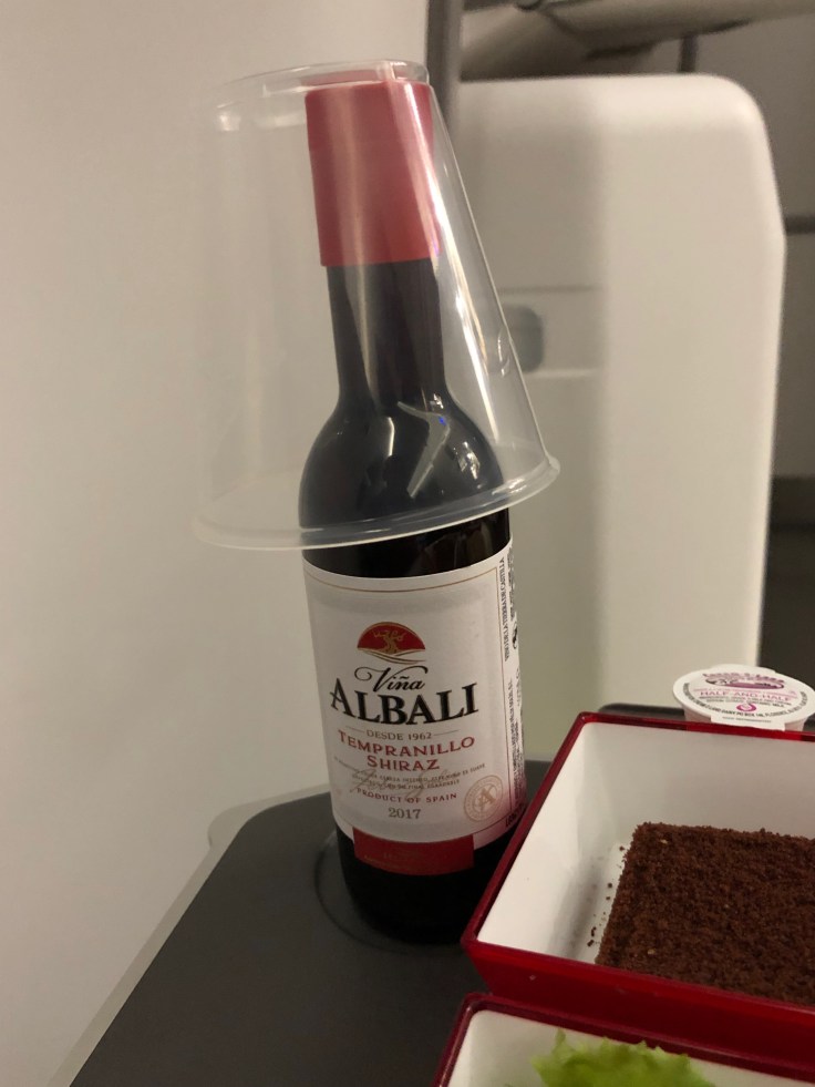 2019 iberia premium economy 06 01 dinner wine presentation